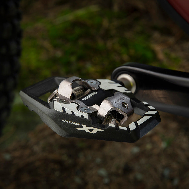 Shimano Deore XT PD-M8120 Clipless Pedals w/Cleat (SM-SH51) shown on a crank, with the top showing.