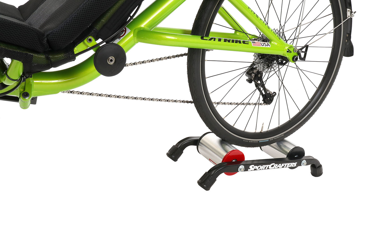 This is a side view of the SportCrafters Trike Trainer Overdrive, shown with a trike mounted, on a white background.