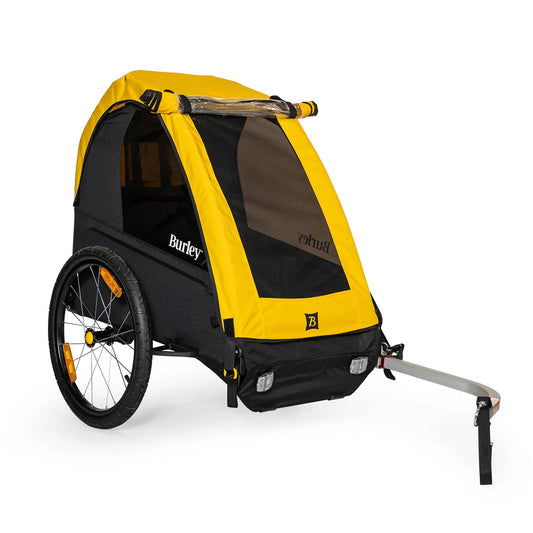 Front quarter view of the Burley Bee Single Child Trailer in Yellow, with a white background.