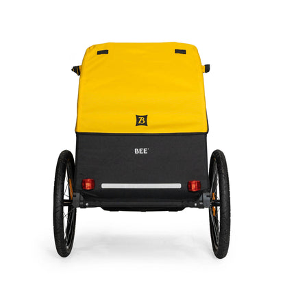 Rear view of the Burley Bee Single Child Trailer in Yellow, shown with a white background.