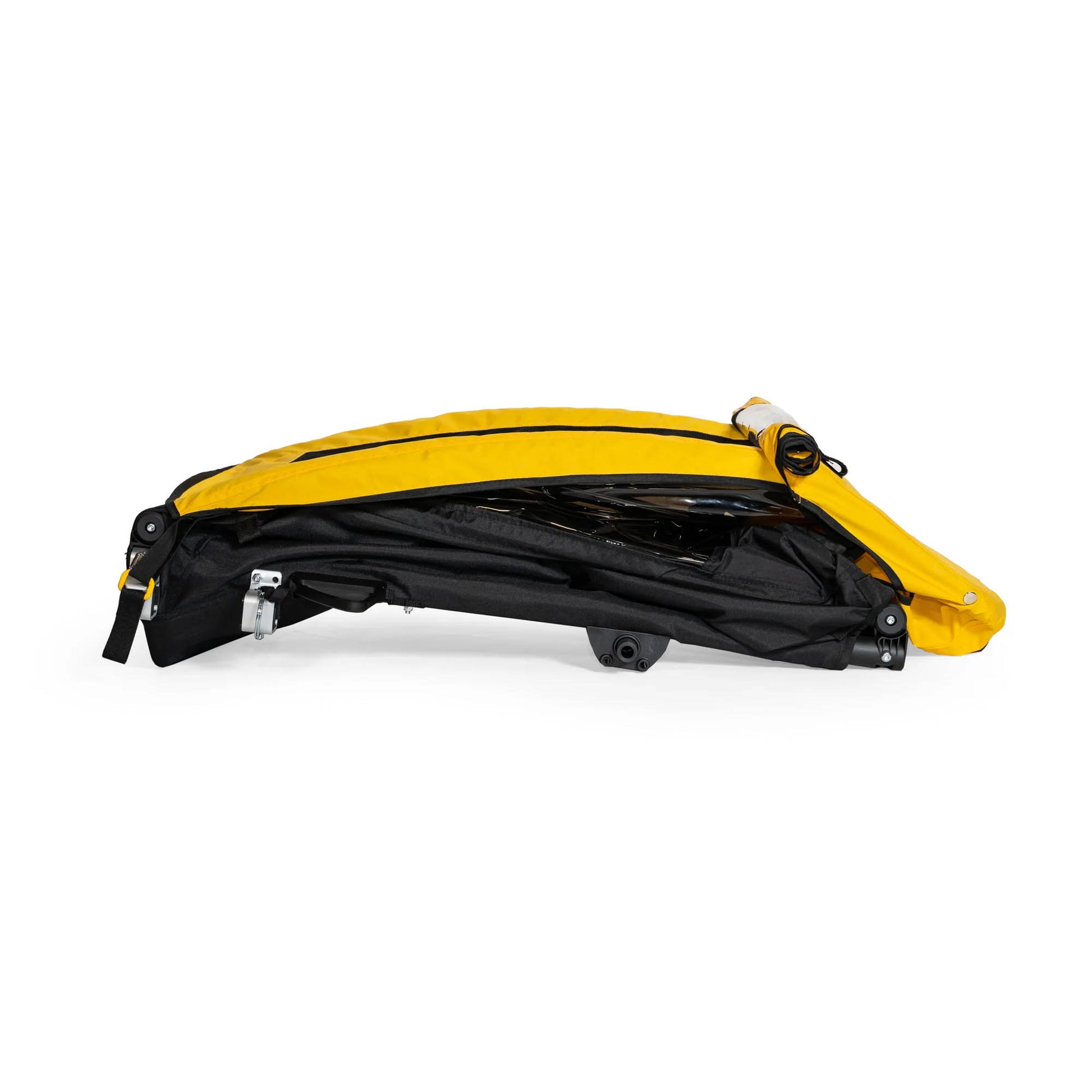 Side view of the Burley Bee Single Child Trailer in Yellow, shown folded with the wheels removed, with a white background.