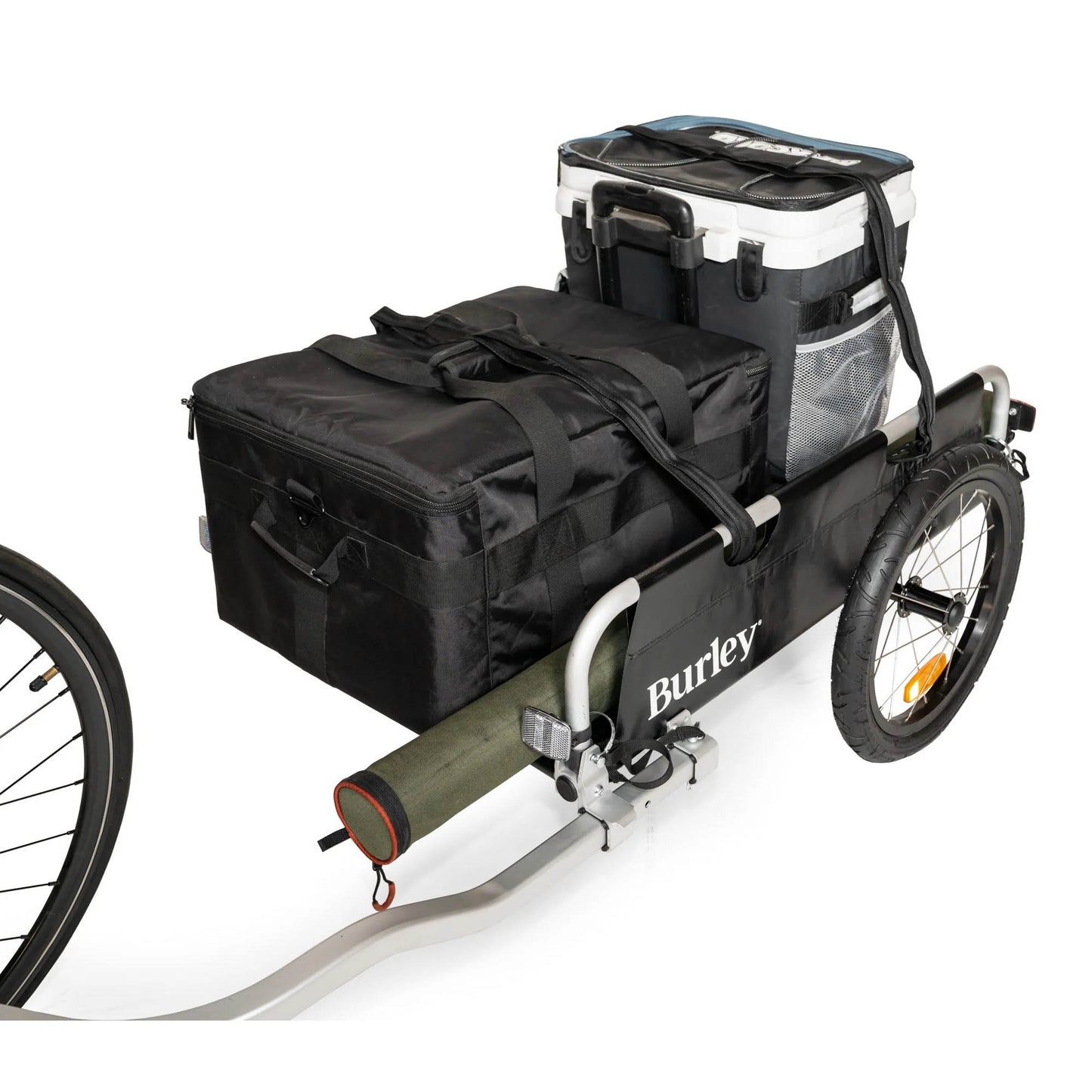 Front quarter view of the Burley Flatbed Cargo Trailer, packed with cargo and coolers, on a white background.