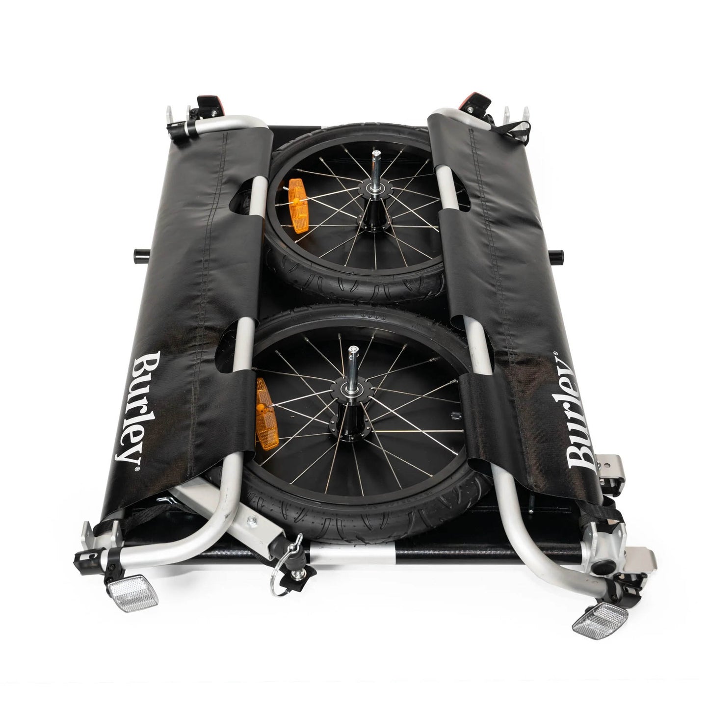 Side view of the Burley Flatbed Cargo Trailer, shown folded with the wheels removed, on a white background.