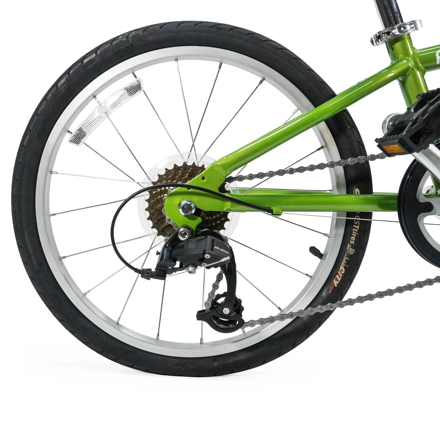 Detailed view of the Burley Piccolo Trailer Cycle in Green, showing the 7-speed drivetrain, on a white background.