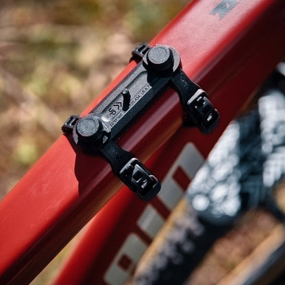 Fidlock TWIST Universal Base shown mounted on mountain bike frame