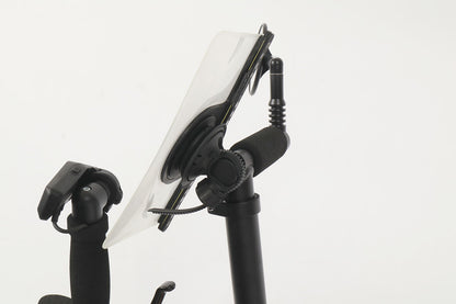 Studio side profile view of a Fidlock VACUUM Handlebar Base Flex mount installed on a stand-up aid of a recumbent trike