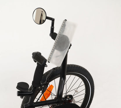 Studio view of a Fidlock VACUUM Handlebar Base Flex, installed on the standup aid of a recumbent trike. 