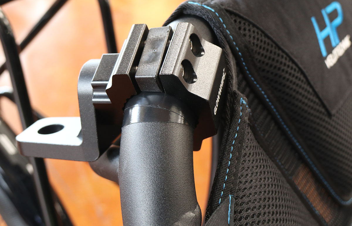 Close up view of the 360 degree mount installed on the black seat frame of an HP Velotechnik recumbent. 