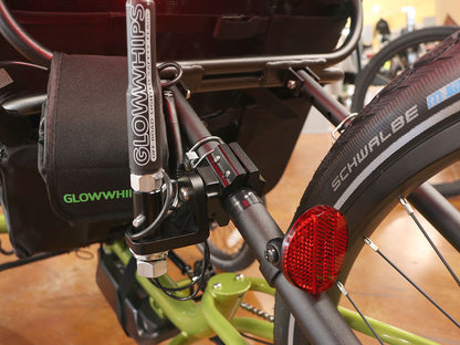Close up of the 360 degree mount installed on the seat stays of a green recumbent trike. 