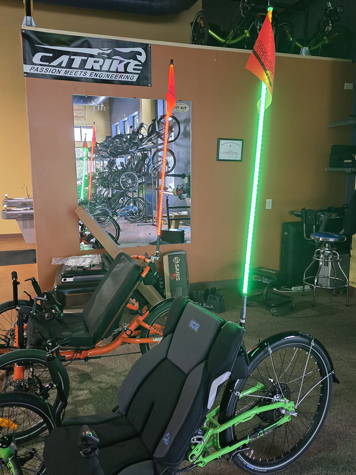 Glowwhips 4ft Bicycle Light Kit, mounted on trikes