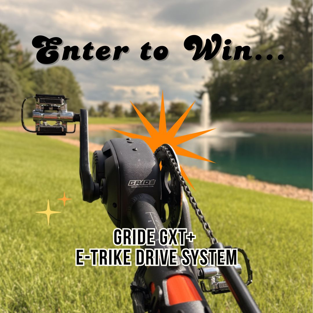 GRIDE GXT+ E-Trike Drive System on grass with text 'Enter to Win' and 'GRIDE GXT+ E-Trike Drive System'.