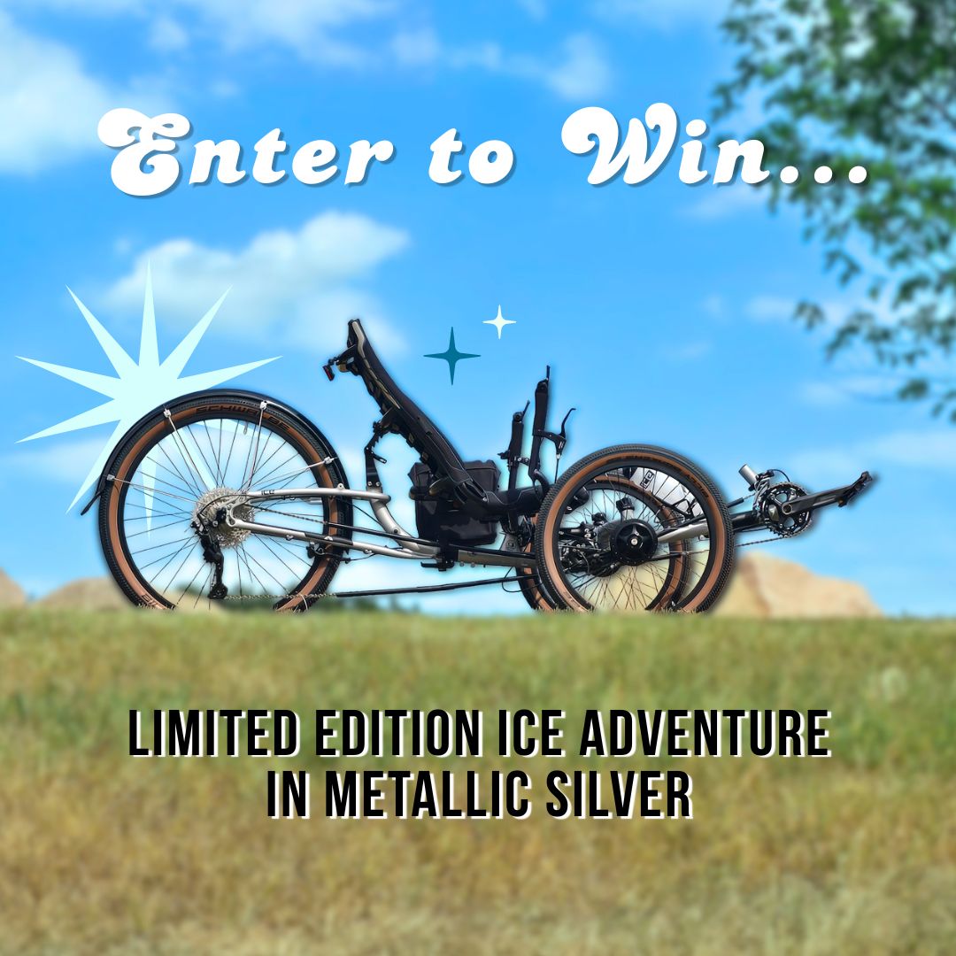 Limited edition ice adventure bike in metallic silver with a scenic background.