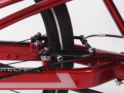 Close up studio image of parking brake installed on a Magma Red Gekko fx recumbent trike. 