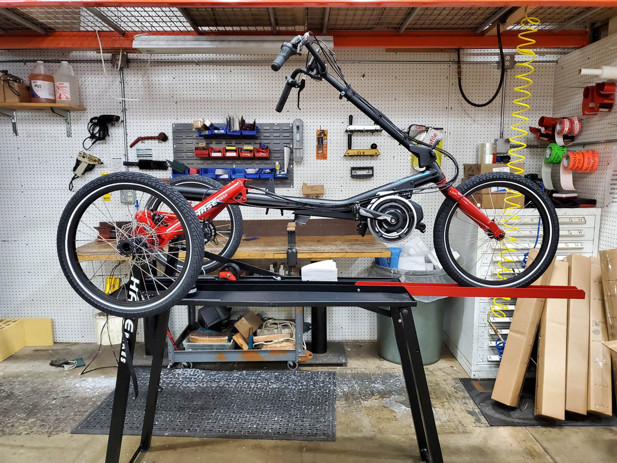 Hase work stand for recumbent trikes with delta trike on it.