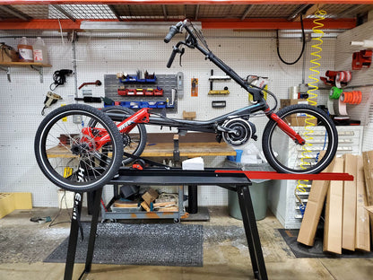 Hase work stand for recumbent trikes with delta trike on it.