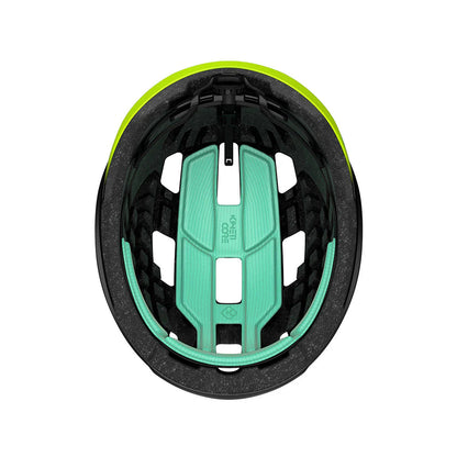 Studio inside view of a helmet with black foam and mint green padding. 