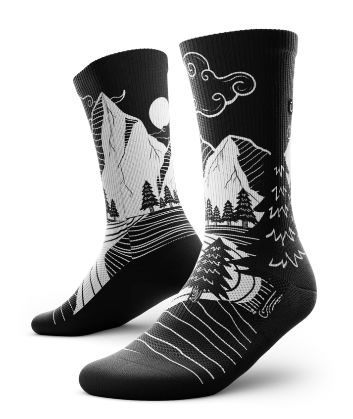 Black and White socks with mountain and forest scene