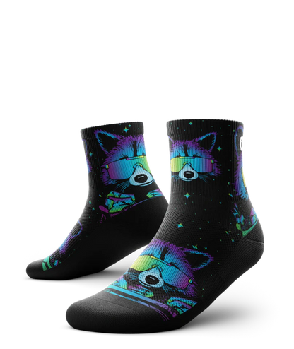 Pair of black sock with heads of racoons wearing sunglasses and garbage cands.  Racoons and garbage cans are blues, purples, teals, and yellows, background is black.