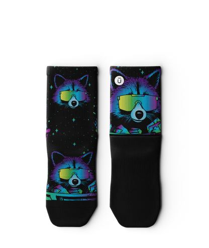 Pair of black sock laying flat with heads of racoons wearing sunglasses and garbage cands.  Racoons and garbage cans are blues, purples, teals, and yellows, background is black.