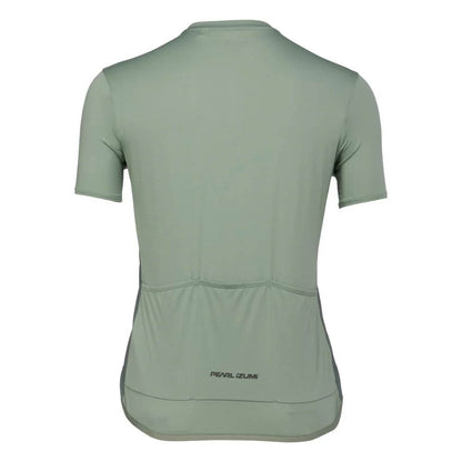 Studio image of the Pearl Izumi Sugar Jersey showing three open pockets across the lower back and dark green lettering that says Pearl Izumi at the base of the middle pocket. 