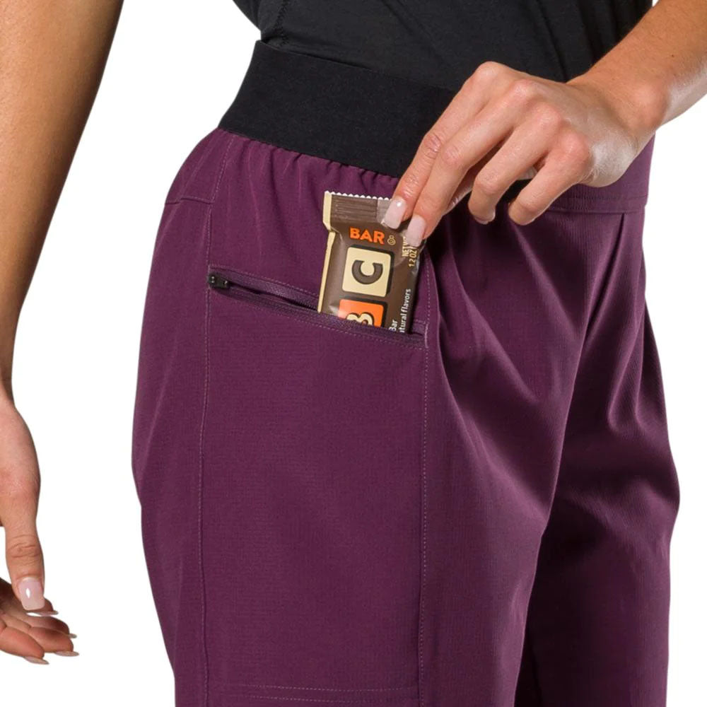 Pearl Izumi Womens Cayon Shorts Dark Violet, studio model pocket detail view