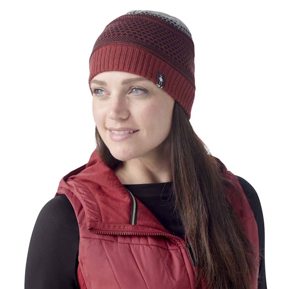 Smartwool Popcorn Cable Reversible Beanie in Currant Heather, studio front quarter view, with model