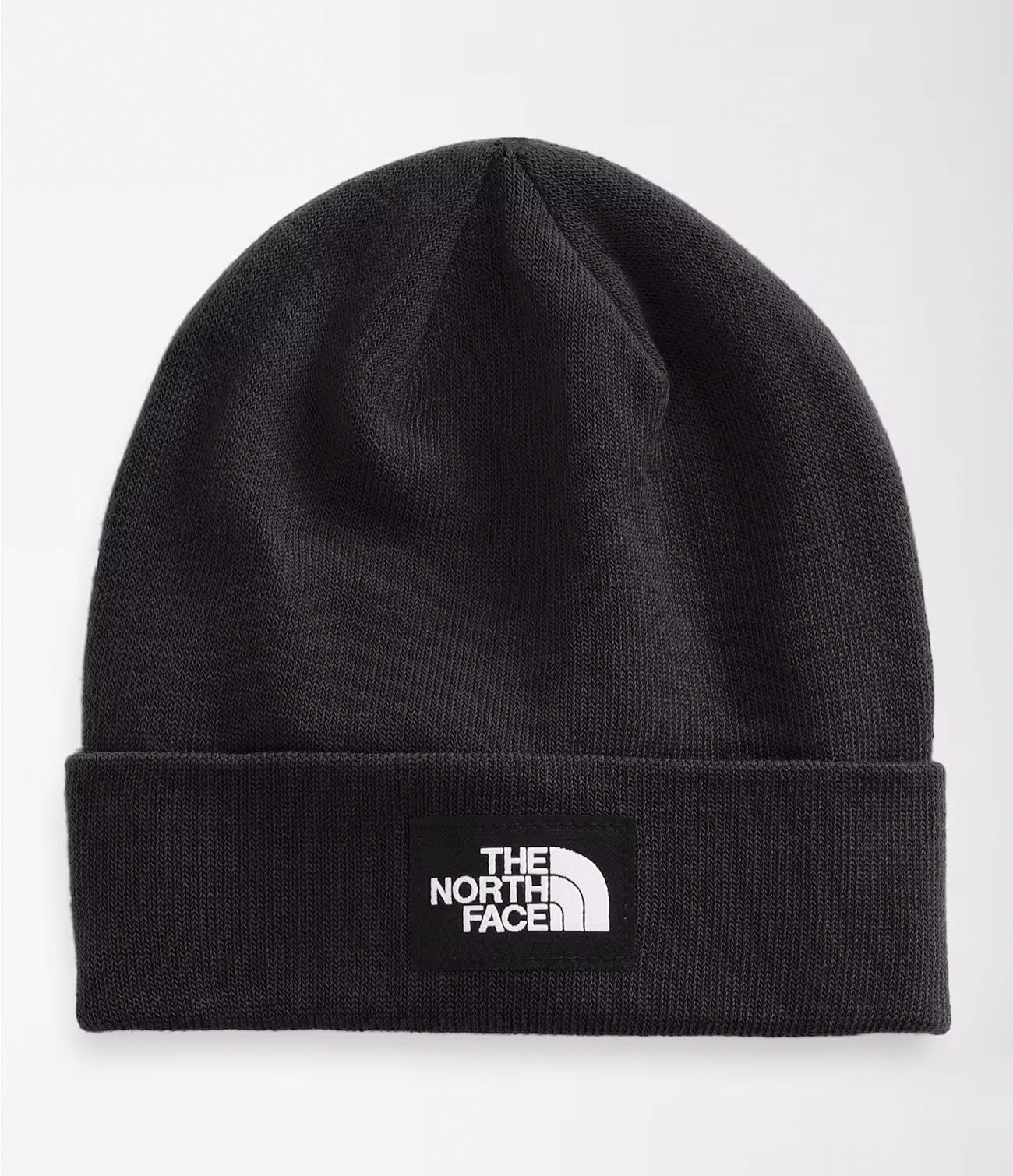 Studio image of Black cuffed beanie with white and black The North Face logo patch in center of cuff. 