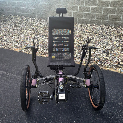Front view of the Azub Demo Ti-Fly 20 Enviolo Shimano EP6 Pastel Violet Recumbent Trike in an outdoor setting.