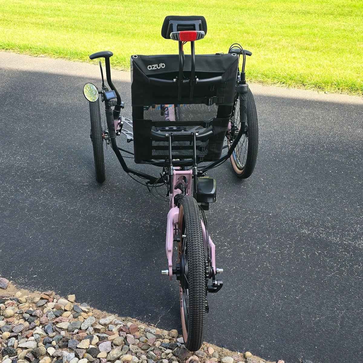 Rear view of the Azub Demo Ti-Fly 20 Enviolo Shimano EP6 Pastel Violet Recumbent Trike in an outdoor setting.