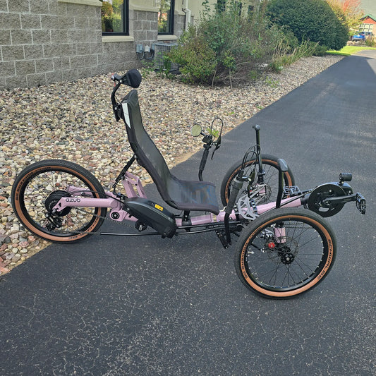Side view of the Azub Demo Ti-Fly 20 Enviolo Shimano EP6 Pastel Violet Recumbent Trike in an outdoor setting.