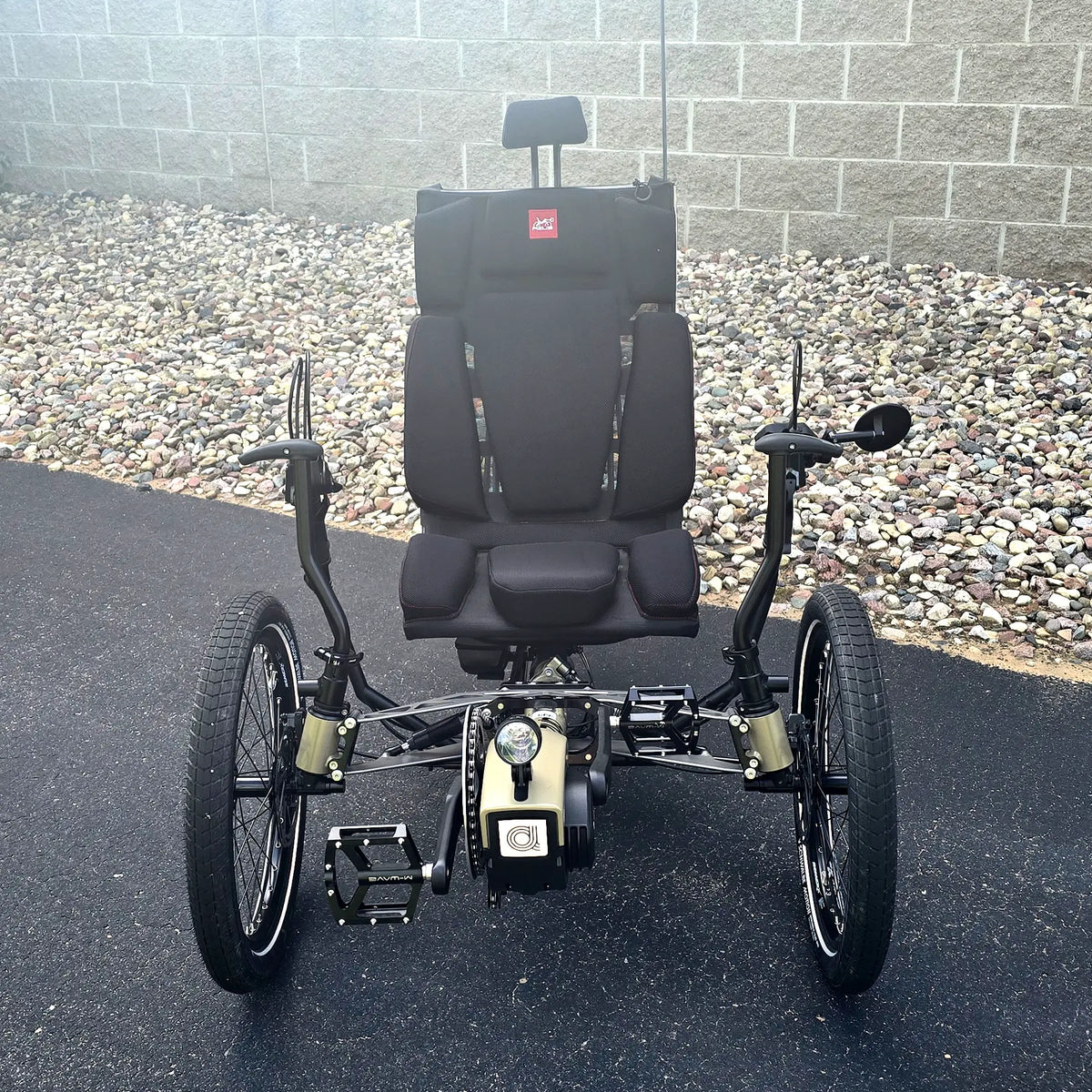 Front view of the Azub Demo Ti-Fly 26 Bosch Performance CX Dark Sand Recumbent Trike in an outdoor setting.