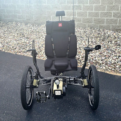 Front view of the Azub Demo Ti-Fly 26 Bosch Performance CX Dark Sand Recumbent Trike in an outdoor setting.