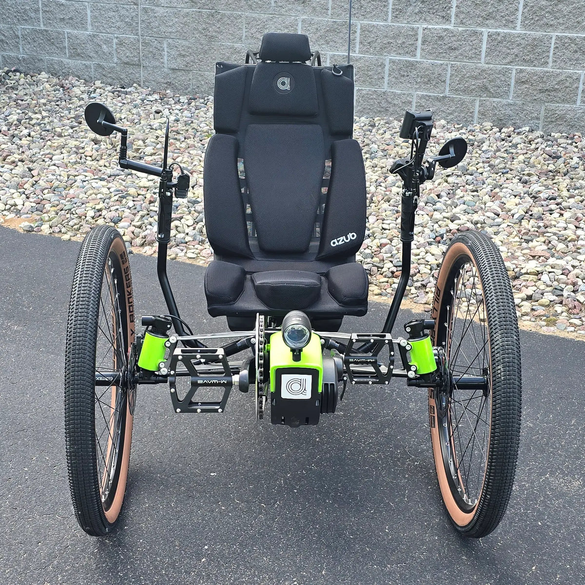 Front view of the Azub Demo Ti-Fly X Rohloff E14 Bosch Performance CX Dual Battery Lime Green Recumbent Trike in an outdoor setting.