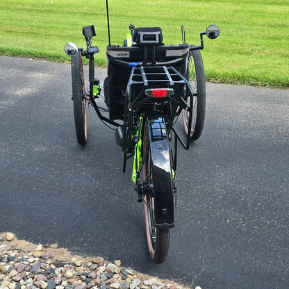 Rear view of the Azub Demo Ti-Fly X Rohloff E14 Bosch Performance CX Dual Battery Lime Green Recumbent Trike in an outdoor setting.