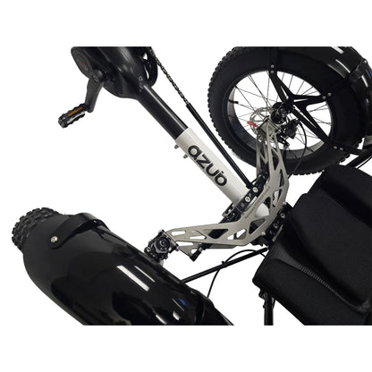 Closeup view of the logo and titanium front suspension on the Azub Limited Edition Ti-Fly X Bosch Performance CX with Rohloff E14 Shiny White Recumbent Trike against a white background.
