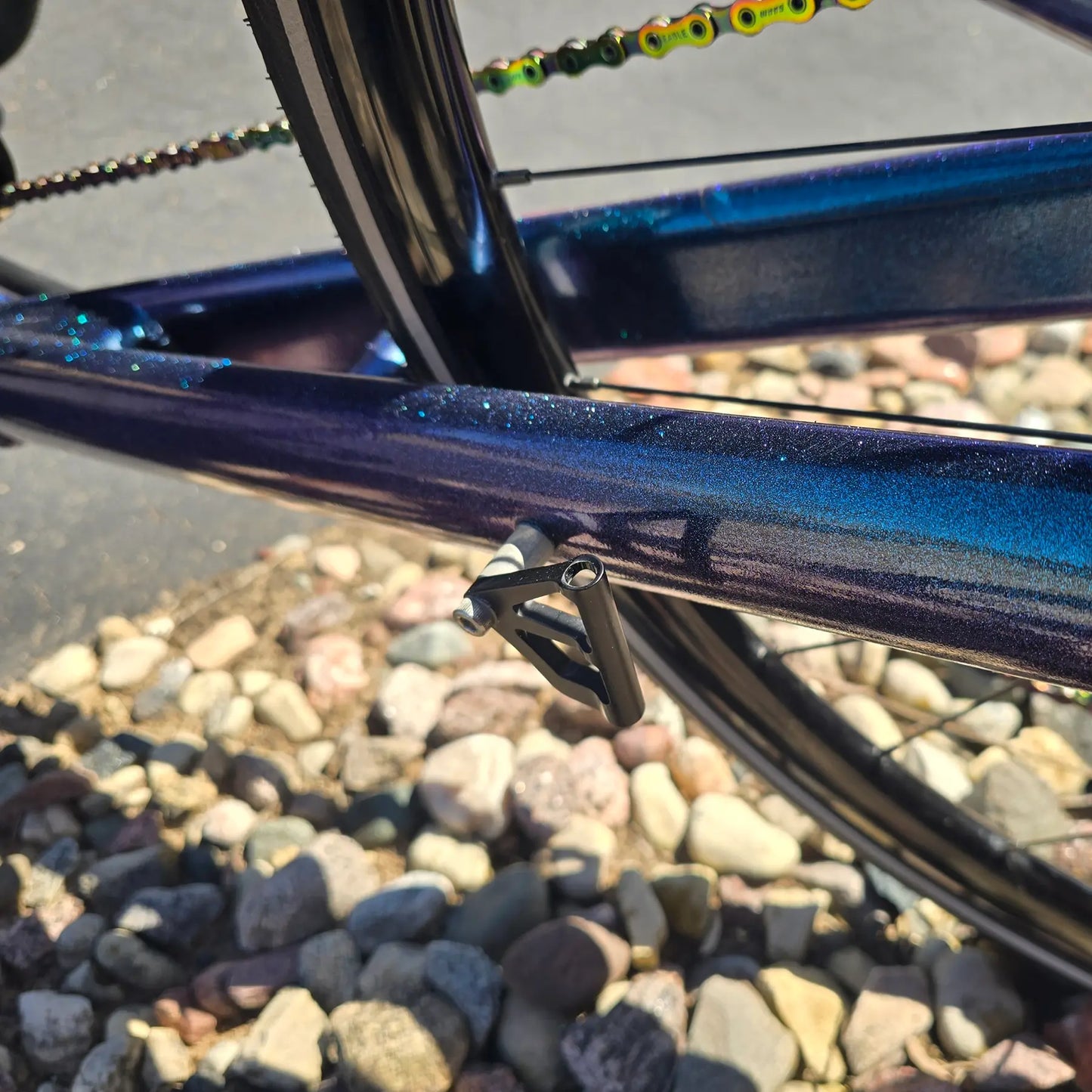 Closeup view of the flag mount on the Azub Used T-Tris 5000 Chameleon Teal Custom Recumbent Trike in an outdoor setting.
