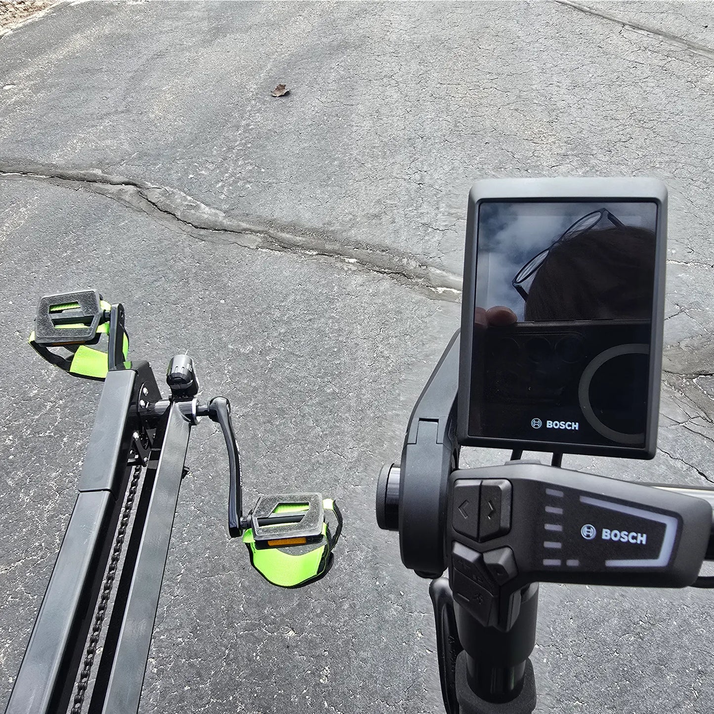 Closeup view of the Bosch controls on the BamBuk Independent Bosch Performance CX Recumbent Tandem Trike in the Hostel Shoppe parking lot.