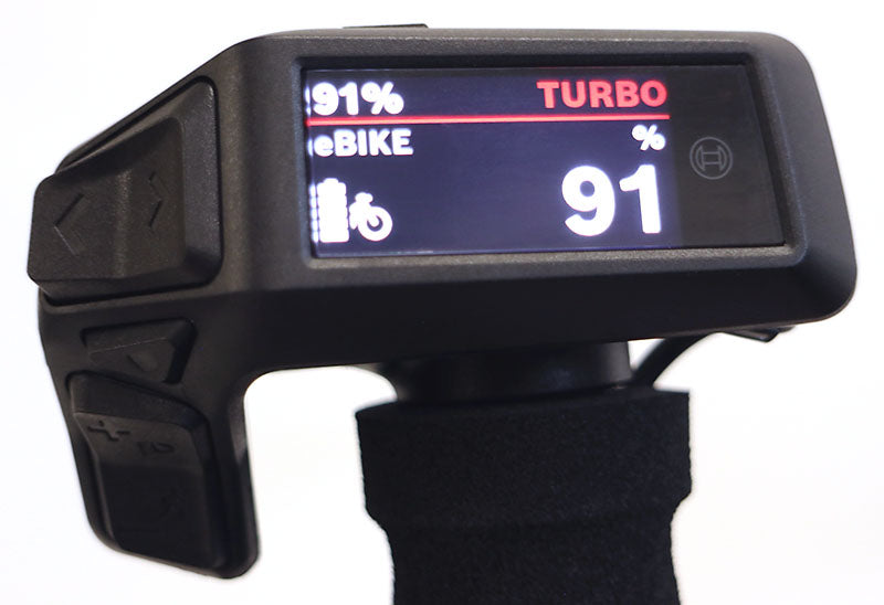 Studio image of a Bosch computer screen that shows 91% battery power in white lettering and the word Turbo in red lettering. 