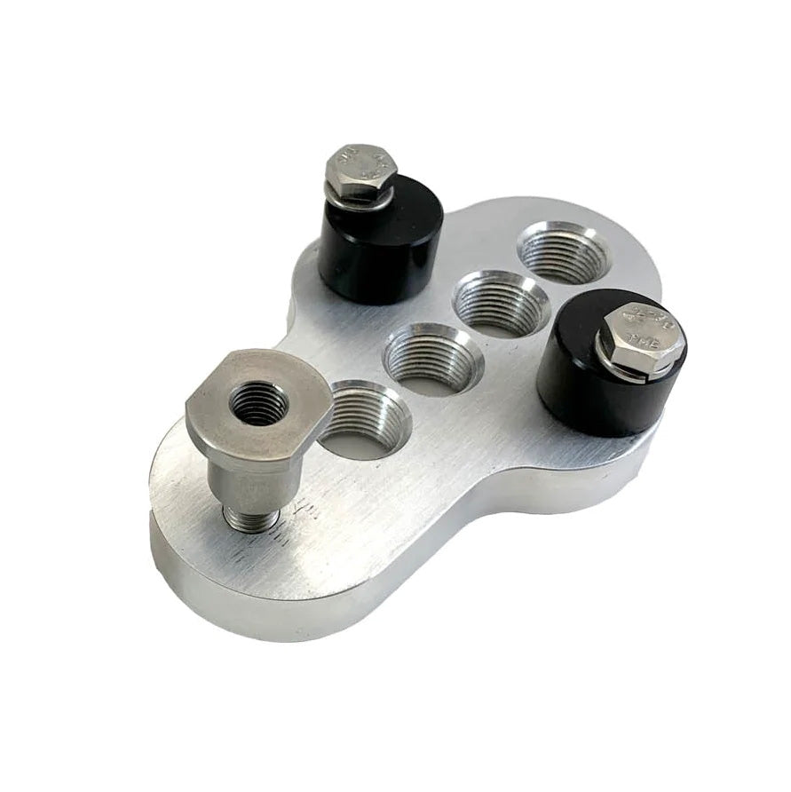 Bottom view of CJ Ackley Machine Company Crank Arm Shorteners Individual in silver showing the black cams, and crank mounting bolt.