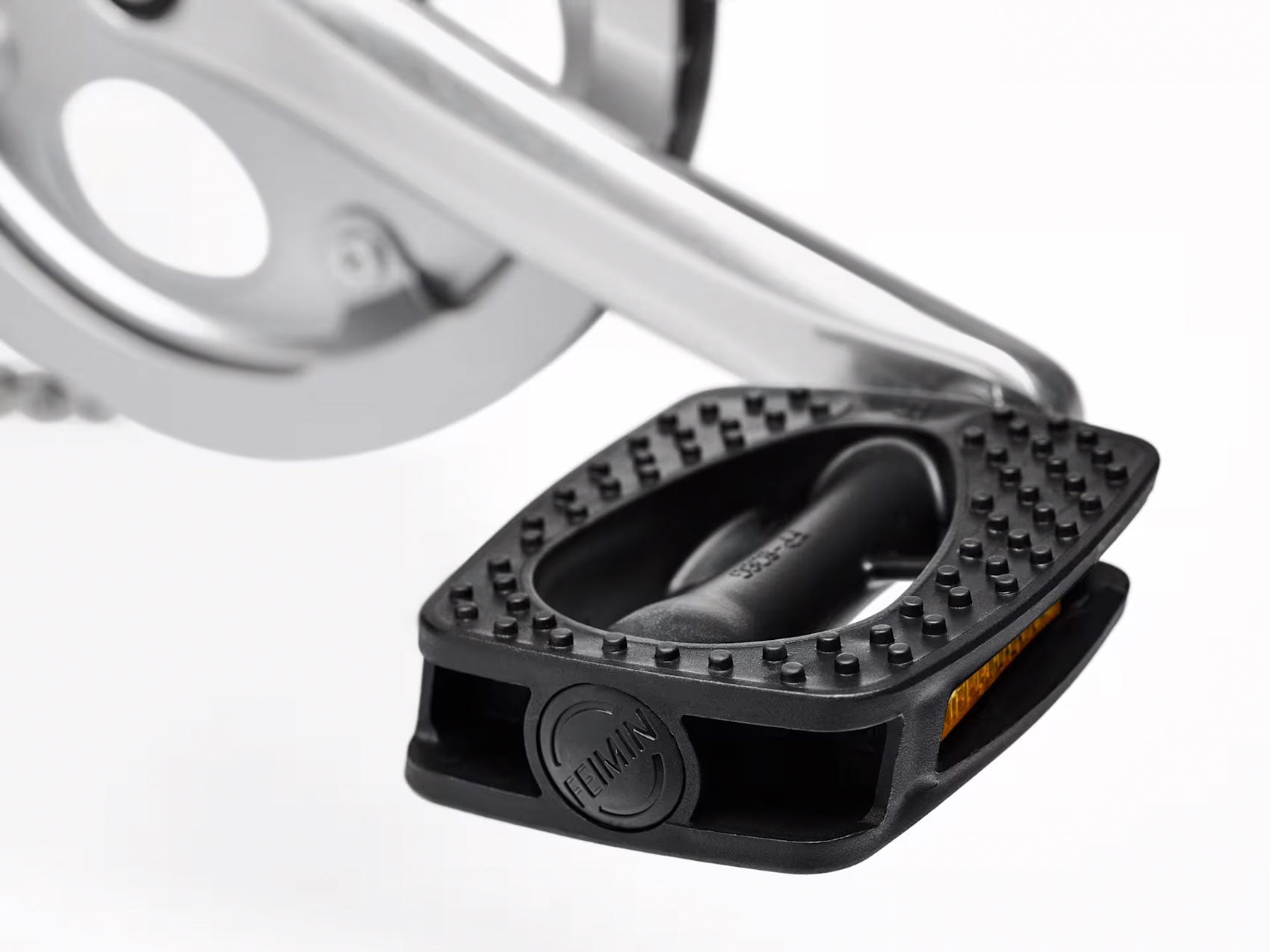 Detail view view of a pedal on the Electra Townie 7D Step-Thru 26 Inch Wheeled Bike in Kiwi, shown on a white background.