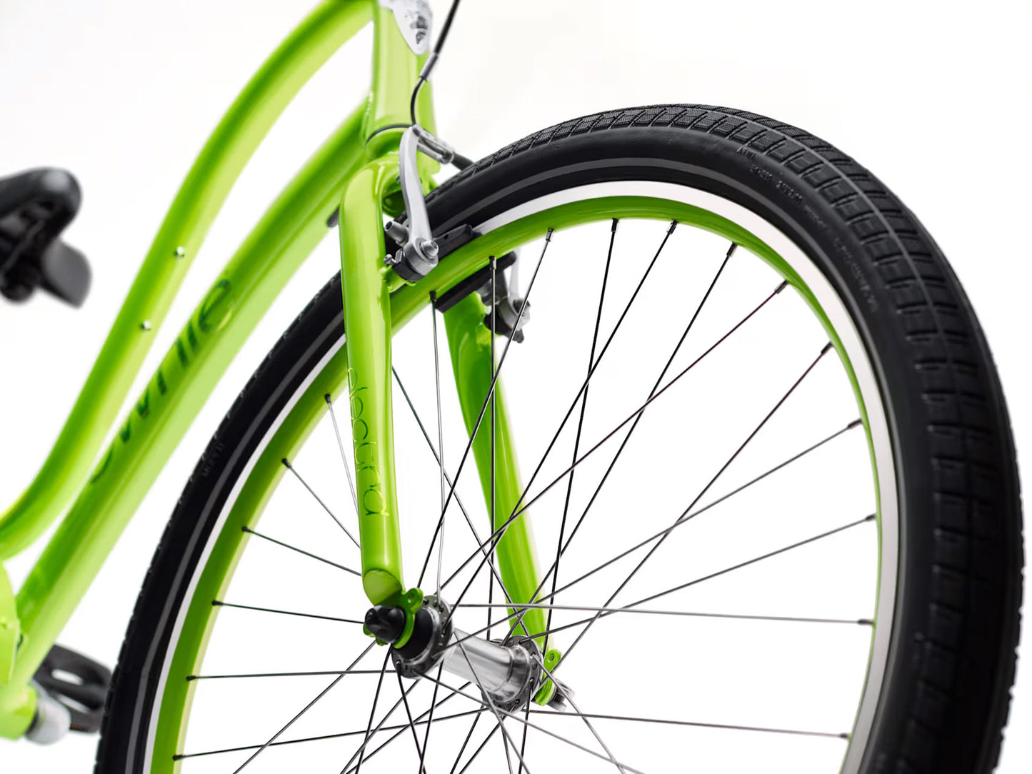 Detail view view of the front fork of the Electra Townie 7D Step-Thru 26 Inch Wheeled Bike in Kiwi, shown on a white background.