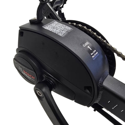 Closeup view of the Bosch Performance Line Motor on the Greenspeed Magnum XL Bosch e-Plus Recumbent Trike against a white background.