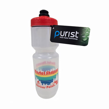 Clear Hostel Shoppe custom water bottle with red cap and colorful design and a Purist brand label against a white background.
