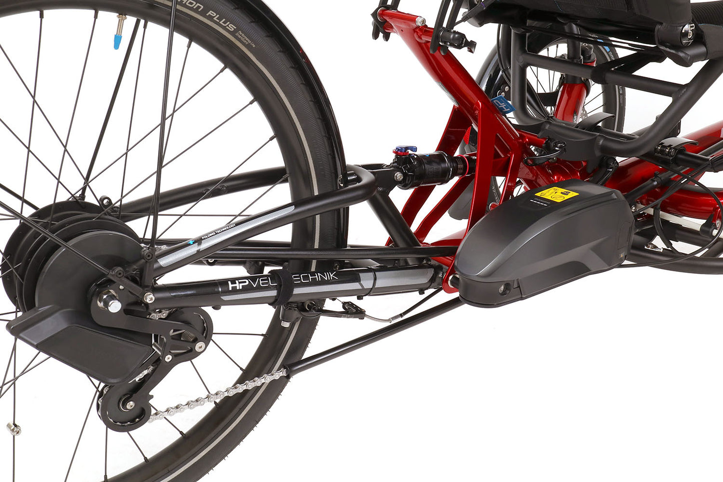 Side detail view of the HP Velotechnik Scorpion fs 26 Plus Steps EP801 in Magma Red/Black, shown on a white background. 