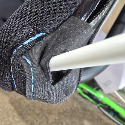 An ICE flag pole mounted in the ICE tube plug with hole under a slit in the seat fabric.