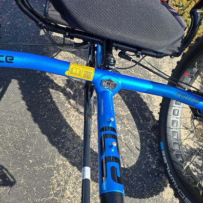 Closeup view of the frame on the ICE Full Fat RS Rohloff Shimano EP8 Hostel Shoppe Limited Edition Custom Blue Recumbent Trike outside in front of the Hostel Shoppe.