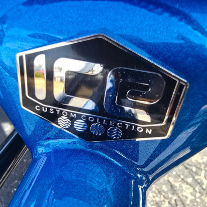 Closeup view of the ICE Custom Collection badge on the ICE Full Fat RS Rohloff Shimano EP8 Hostel Shoppe Limited Edition Custom Blue Recumbent Trike outside in front of the Hostel Shoppe.