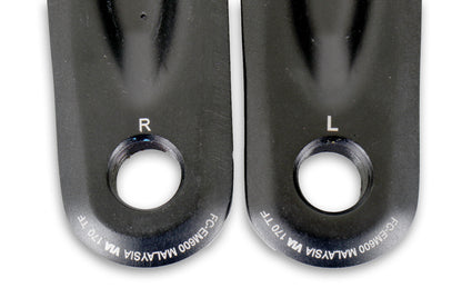 A closeup of the pedal threads of a pair of black ICE Take-Off Shimano Steps EP6 170mm Crankarms. 