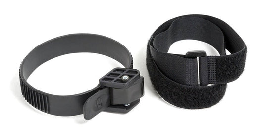 The Kuat Strap Extender Kit photo includes a plastic ratchet strap and a velcro strap against a white background.