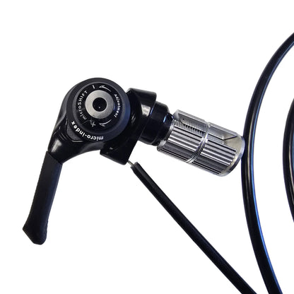 Closeup view of the microShift Take Off 2-3 Speed Front Bar End Shifter in black against a white background.